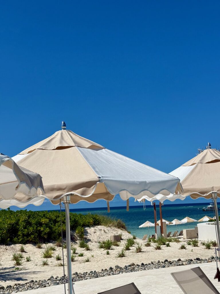 Framed by the turquoise horizon, Salterra’s soft white sand is dotted with elegant beach umbrellas—inviting you to unwind in true South Caicos style.